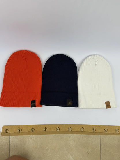 Comparativa de colores: Gorro multiposición rojo; Gorro multiposición blanco roto; Gorro multiposición azul oscuro